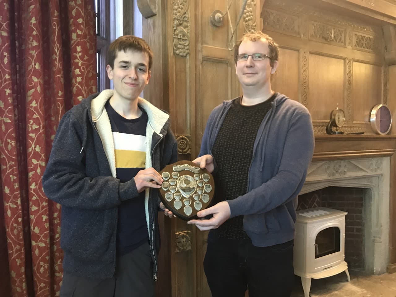 Thomas Receiving M I P shield from Paul